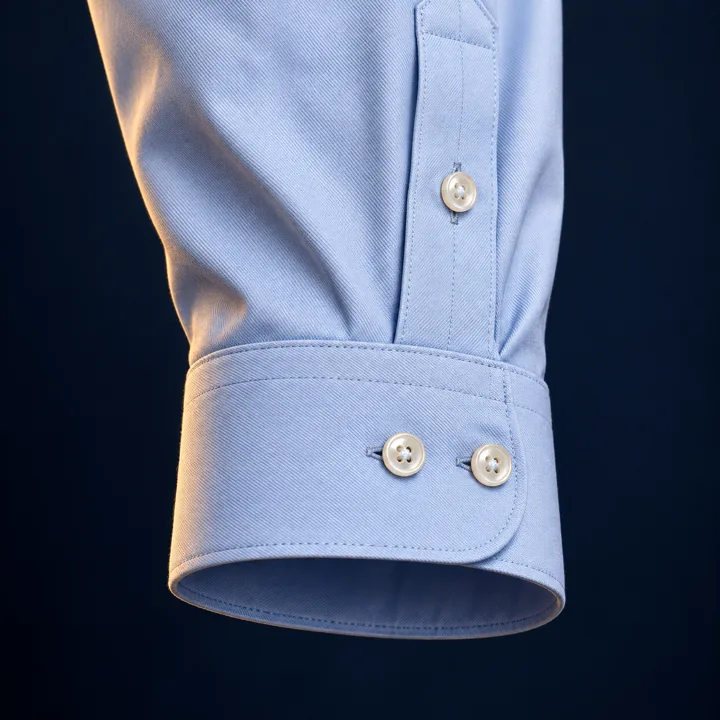 Light blue shirt sleeve with adjustable two-button cuff